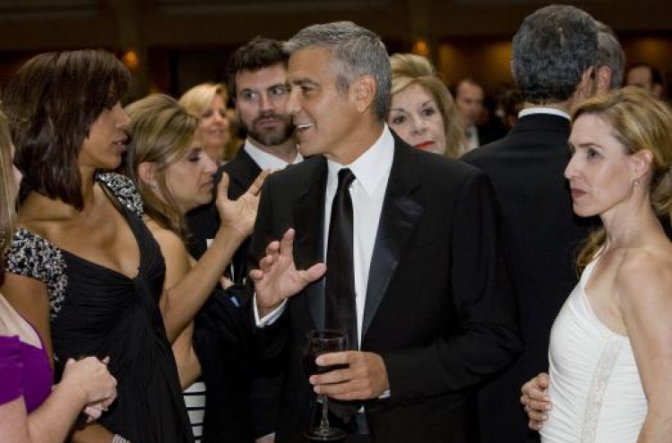 Clooney picks up stranger’s bill