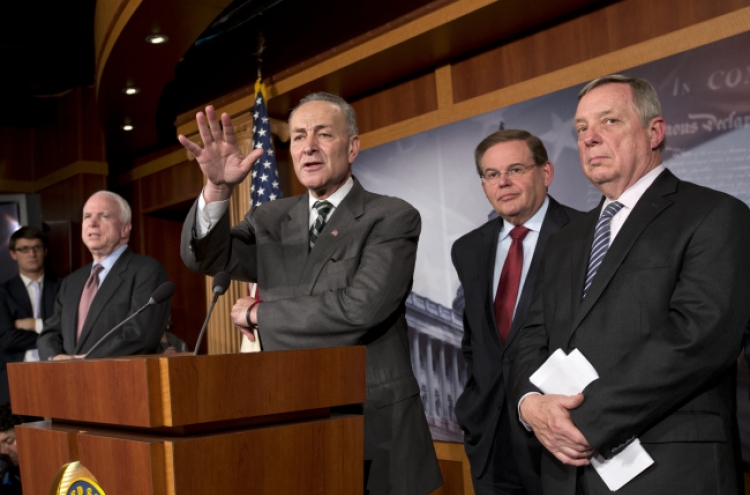 U.S. senators vow immigration action