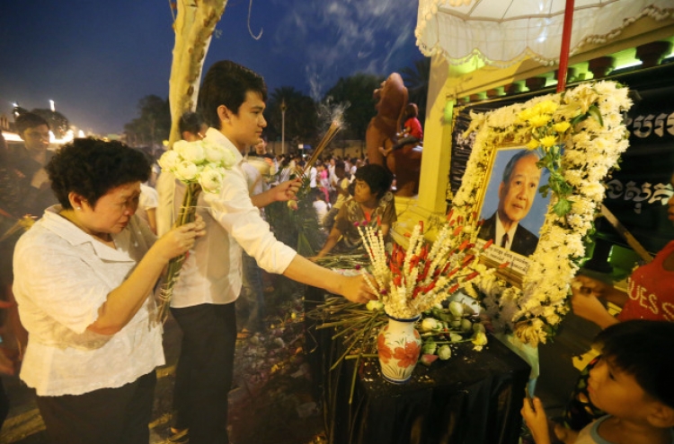 Cambodia mourns as ex-king cremated