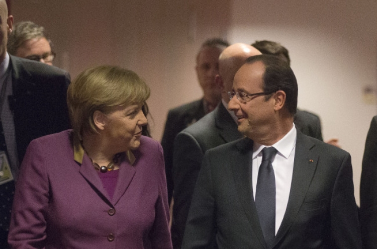 EU leaders OK reduced budget