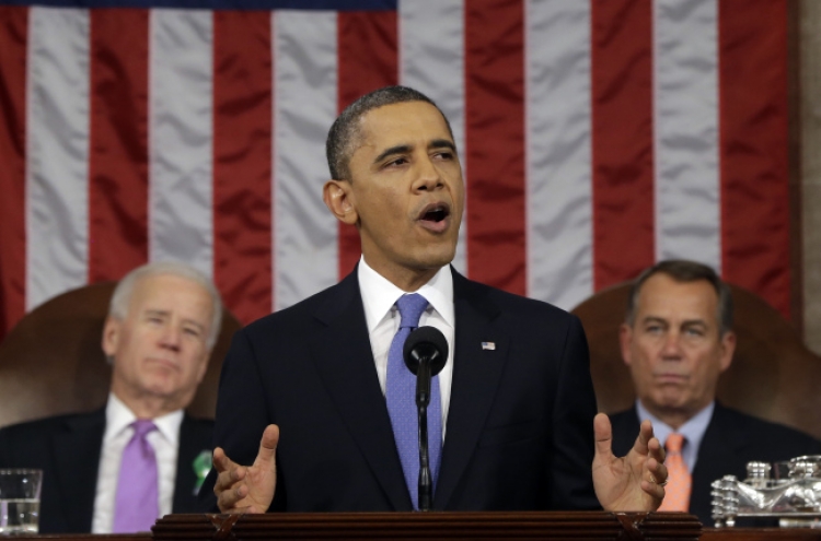 Obama stakes second term on reform