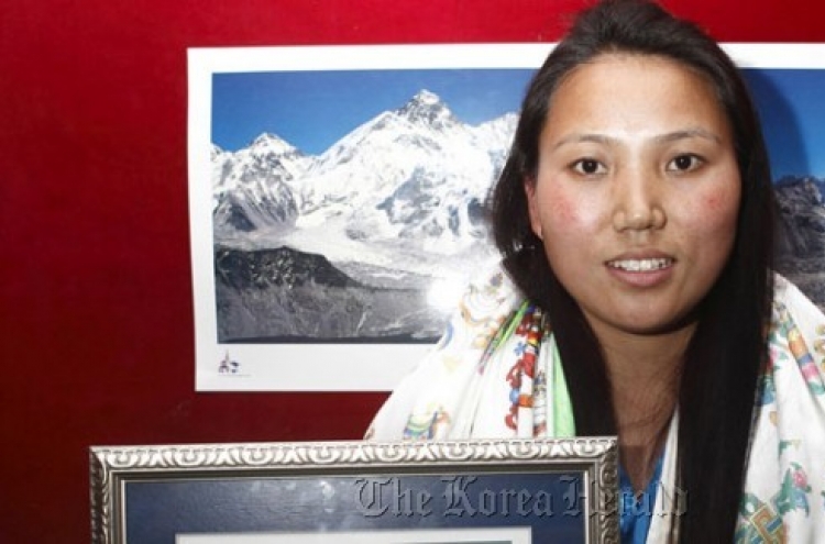 2 Everest climbs put Nepalese woman in record book