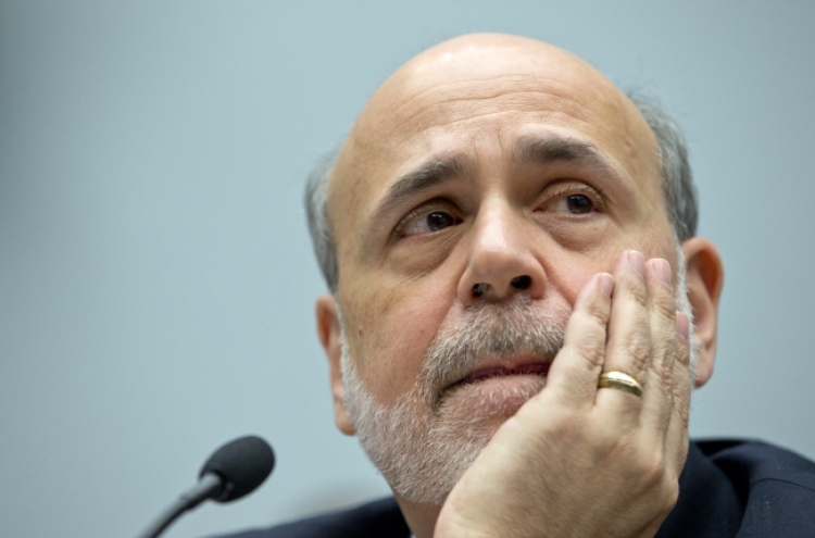 Bernanke defends Fed’s rate policies