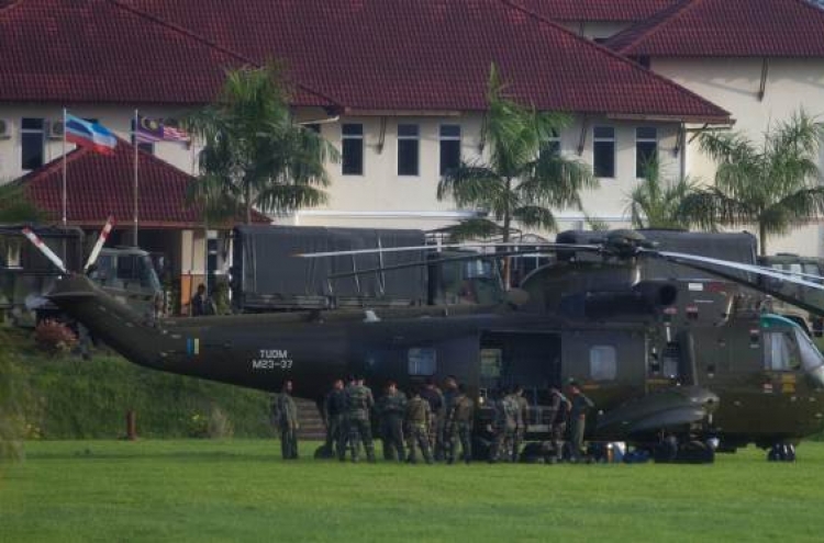 Doubts emerge over Malaysian assault on Filipino invaders