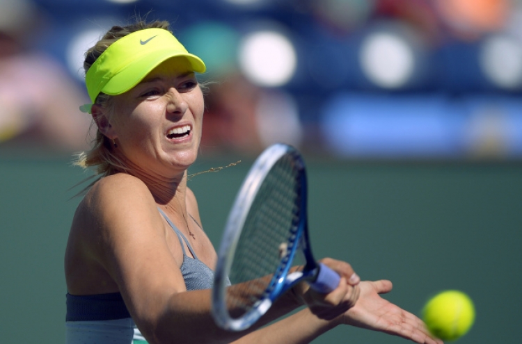 Djokovic, Sharapova win at Indian Wells