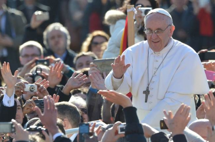 Pope Francis greets crowds at inauguration