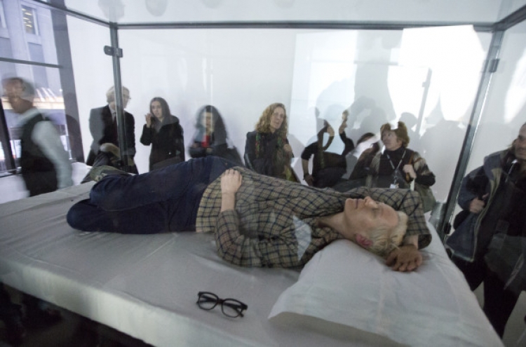 British actress Swinton takes an artful nap at Museum of Modern Art