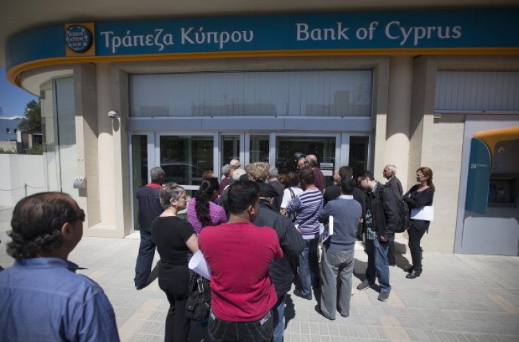 Cyprus capital controls could be lifted in a month