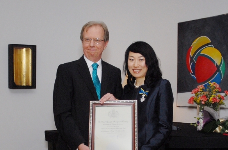 Local embassy staffer receives royal Swedish order