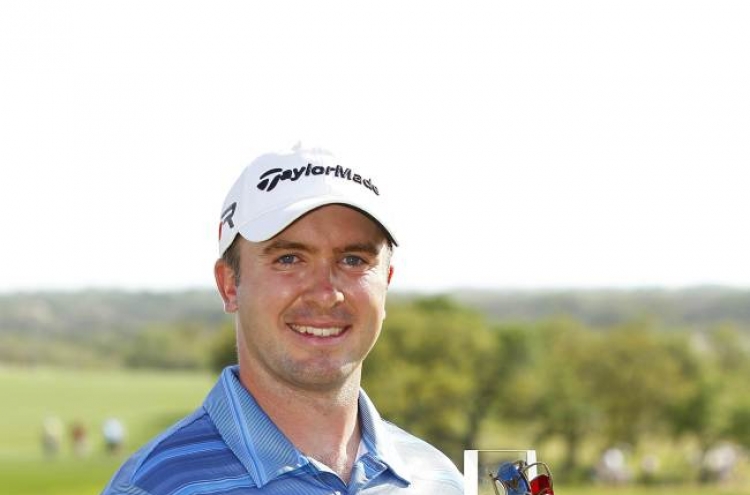 Laird ties course record with 63 to win Texas Open