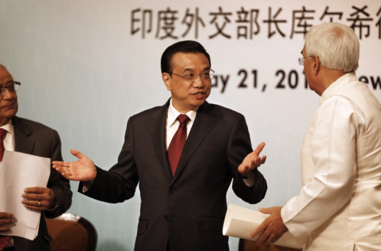 Chinese premier vows to open up markets to India