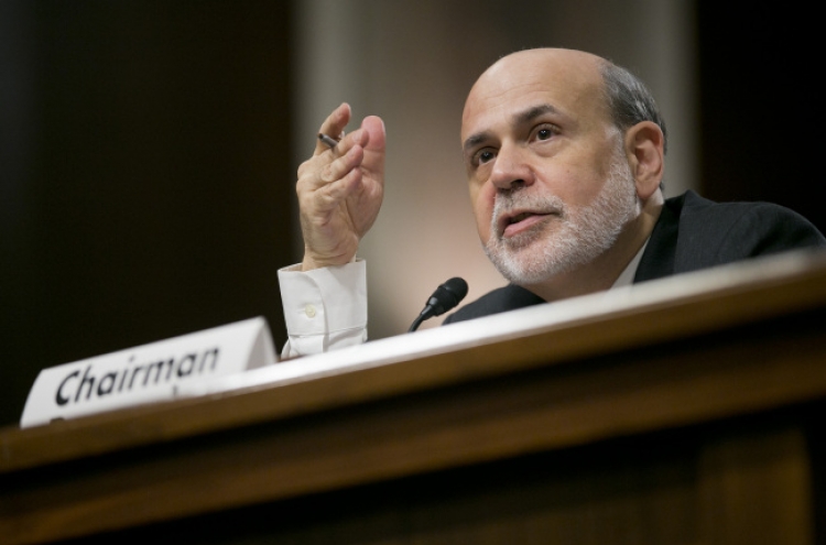 Bernanke signals Fed to stay course