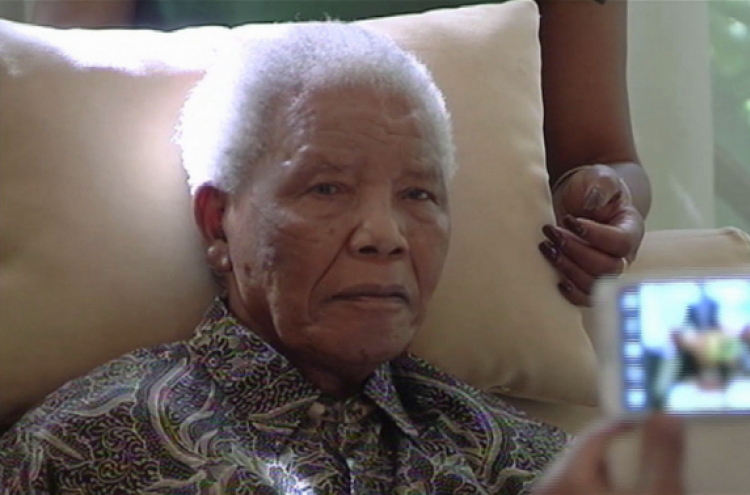 Mandela back in hospital in 'serious but stable' condition