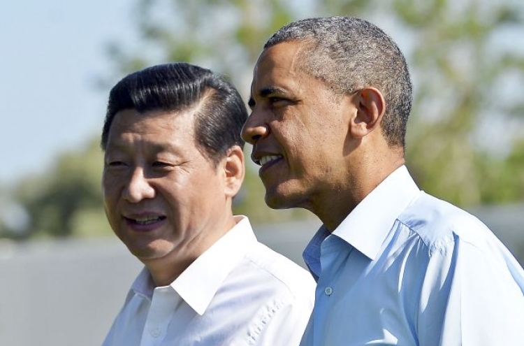 Obama, Xi press N. Korea to denuclearize