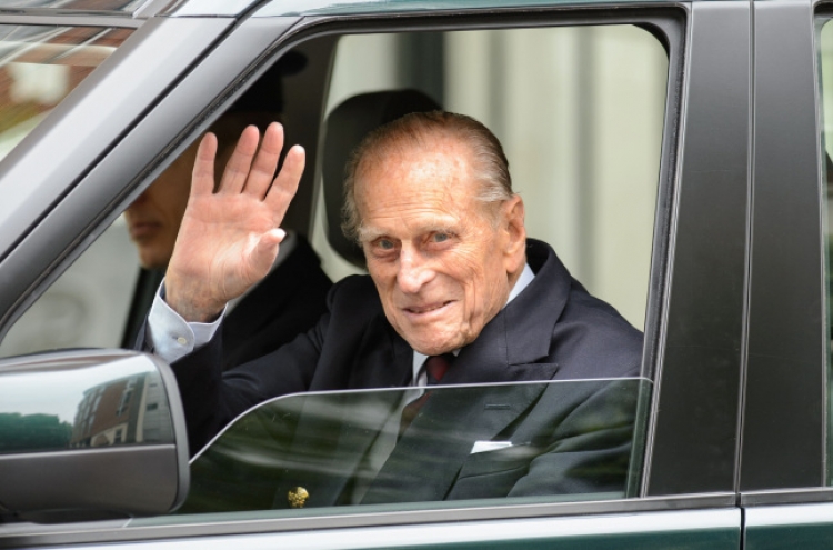 Britain’s Prince Philip leaves hospital after surgery