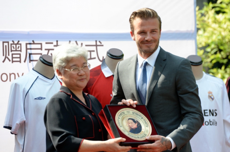 Beckham shines during China visit