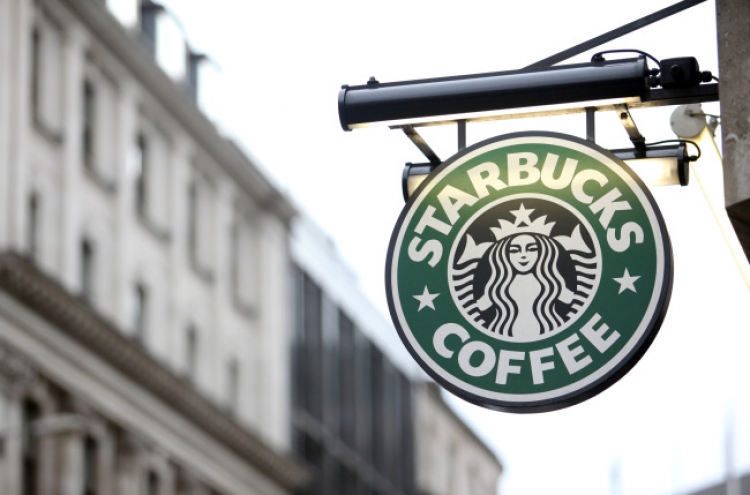 Starbucks says pays British corporation tax after row