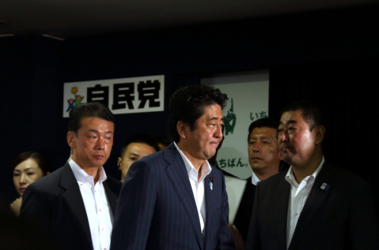 Japan's ruling bloc wins upper house elections