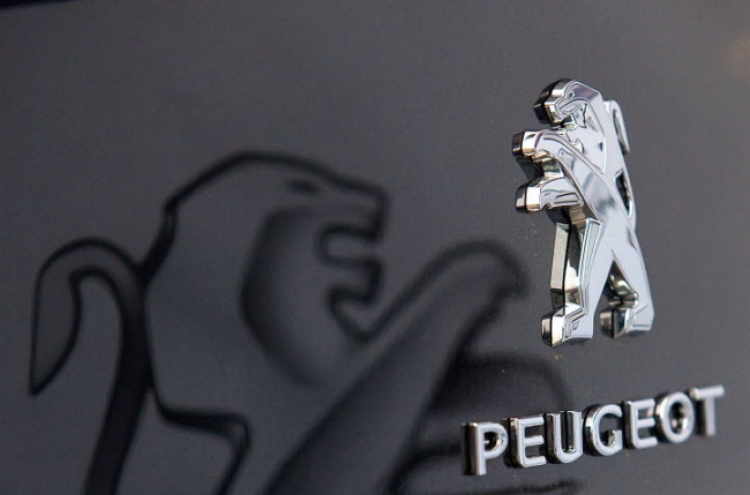 EU clears Peugeot restructuring plan