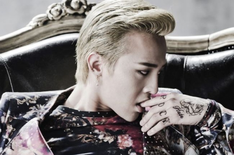 G-Dragon donates 80m won to charity