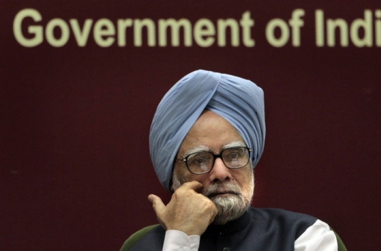 India’s slowest growth since 2009 pressures P.M. Singh to support rupee