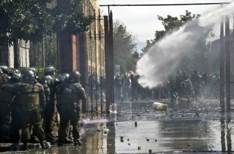 Forty years after Pinochet coup, thousands march for rights in Chile