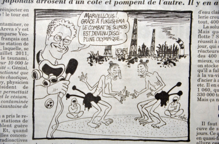 French paper runs satirical cartoon on Fukushima