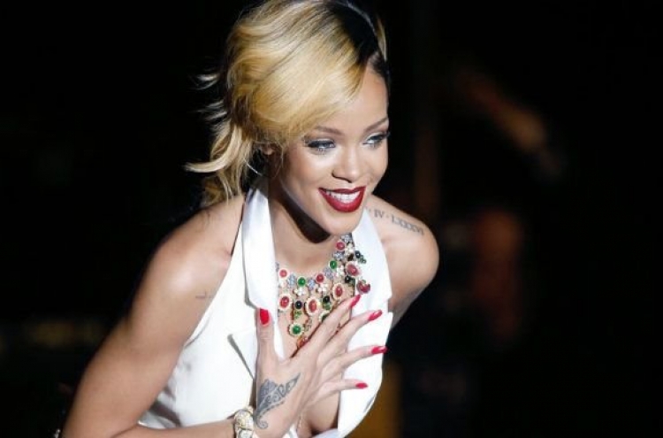 Rihanna selfie with rare Thai primate gets locals arrested