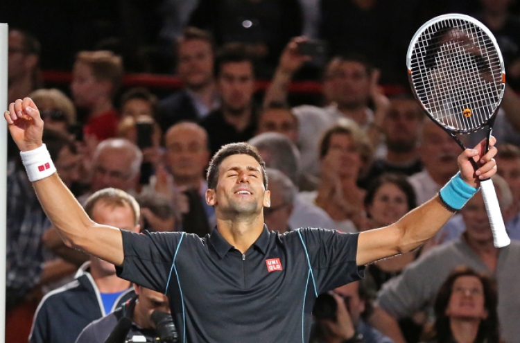 Djokovic edges Ferrer in Paris Masters final