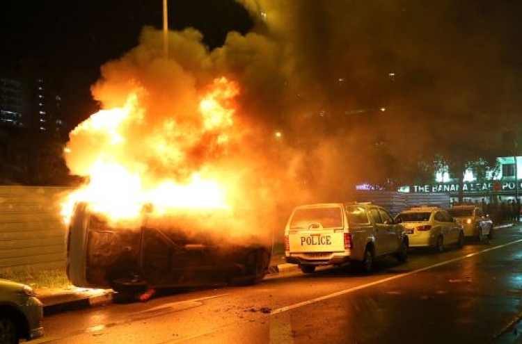 18 hurt after Singapore's worst rioting in decades