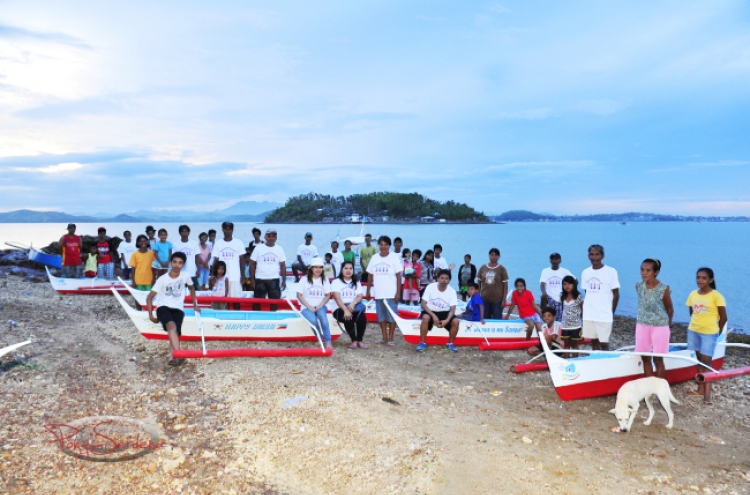 Filipinos in Korea help Haiyan survivors float