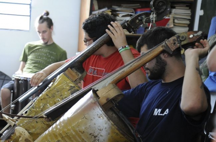 Paraguay group of poor kids turns garbage into sweet melodies