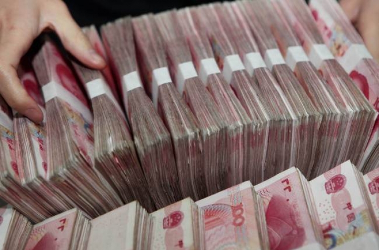 U.S. presses China to ease exchange rate controls