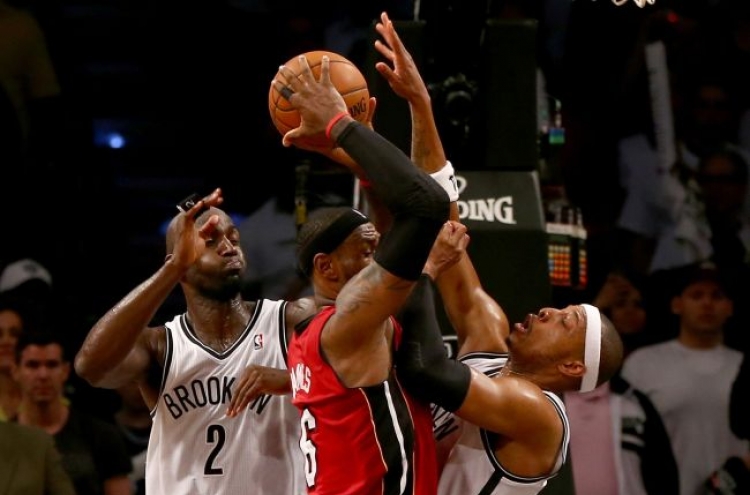 LeBron scores 49 as Heat beat Nets