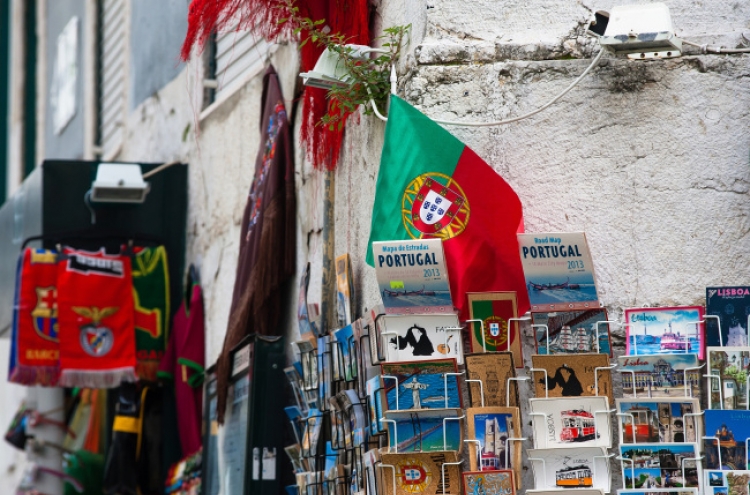 Portugal ends bailout constraints; pain won’t end