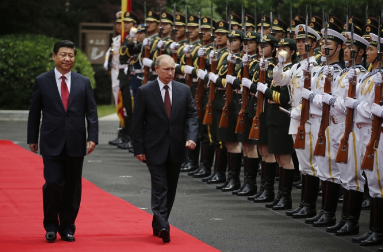 Xi gives Putin a diplomatic boost