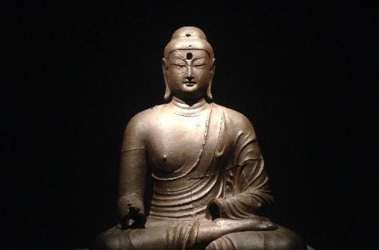 Once ignored, iron Buddha gets new status