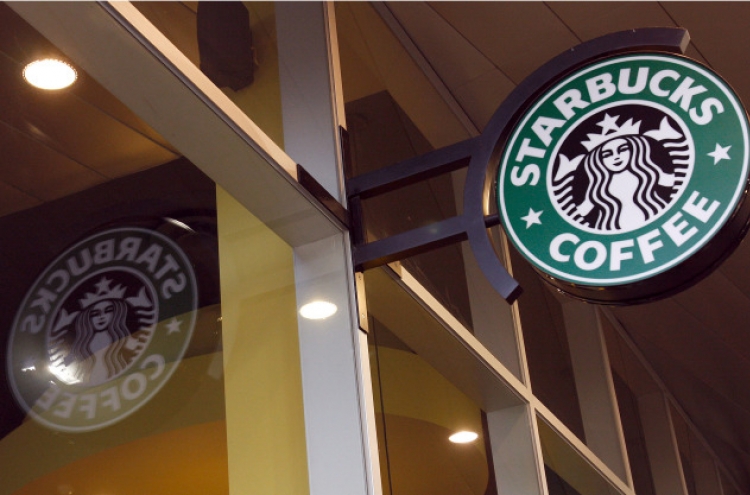 Starbucks sells 24 stores in Australia to 7-Eleven owner