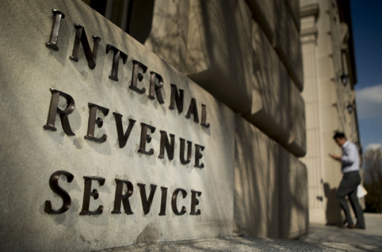 77,000 banks to share tax info with IRS