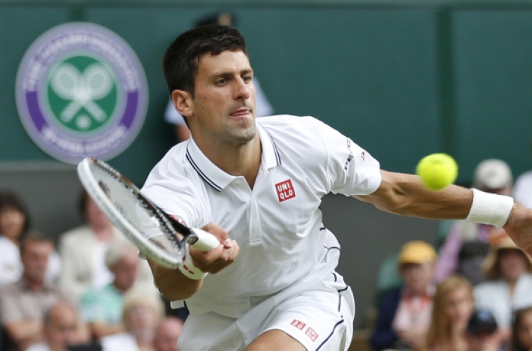 Djokovic survives