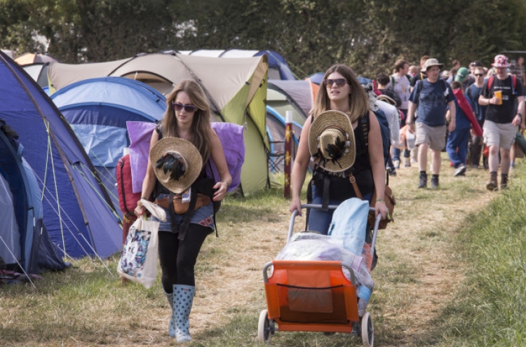 Sun as Glastonbury gates open but mud likely later