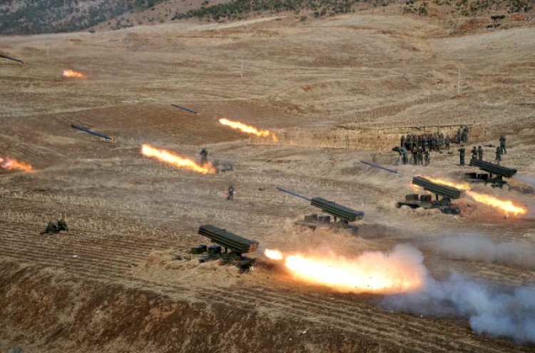 N. Korea fires 100 artillery shells into East Sea