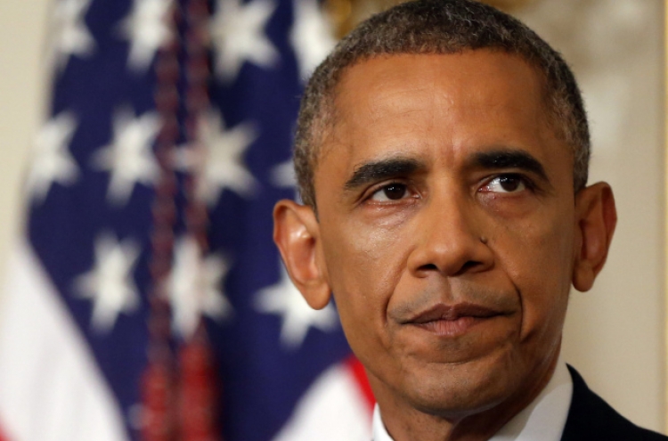 Obama authorizes air strikes to prevent Iraq 'genocide'