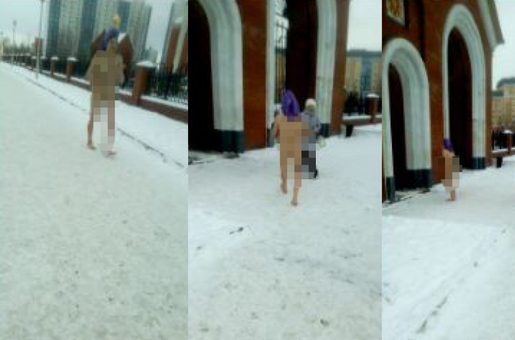 나체로 시베리아 거리 활보하는 여성, 왜?