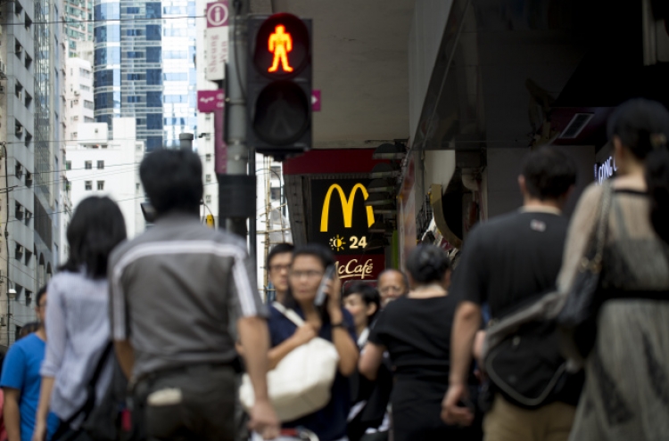 Hong Kong McNuggets, Rolex sales show business as usual