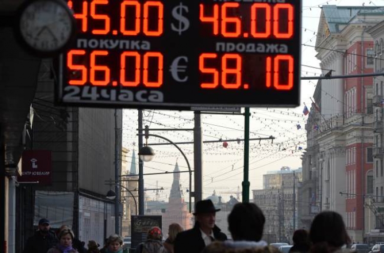 Amid currency gyrations, Russia floats ruble