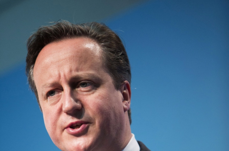 Cameron warns Britain’s recovery faces ‘real risk’