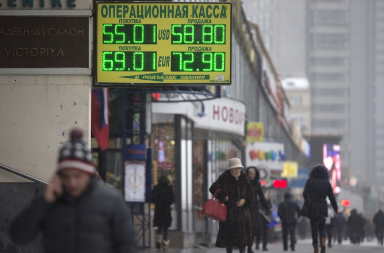 Russia raises key rate to protect ailing economy