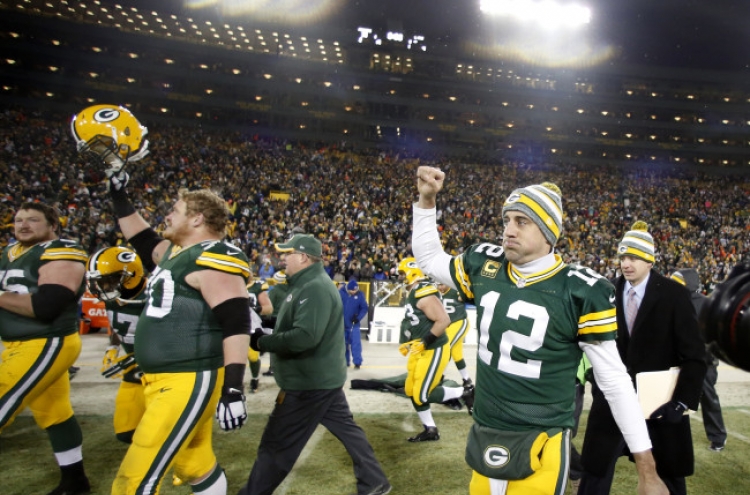 Rodgers, Packers claim NFC North