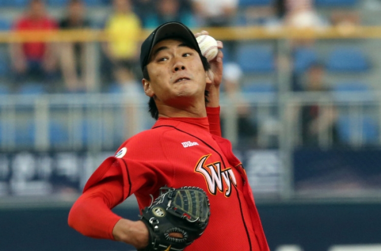 MLB dream on hold, Kim moves on